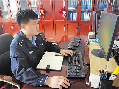 沈祥计工作照。