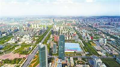     不断拉大的城市框架。