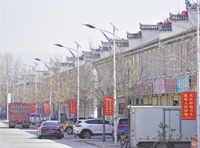 <p>　　圆德村富有现代化气息的街景。</p>