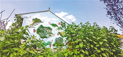 <p>　　冶家村文化墙与人居环境相映成趣。</p>